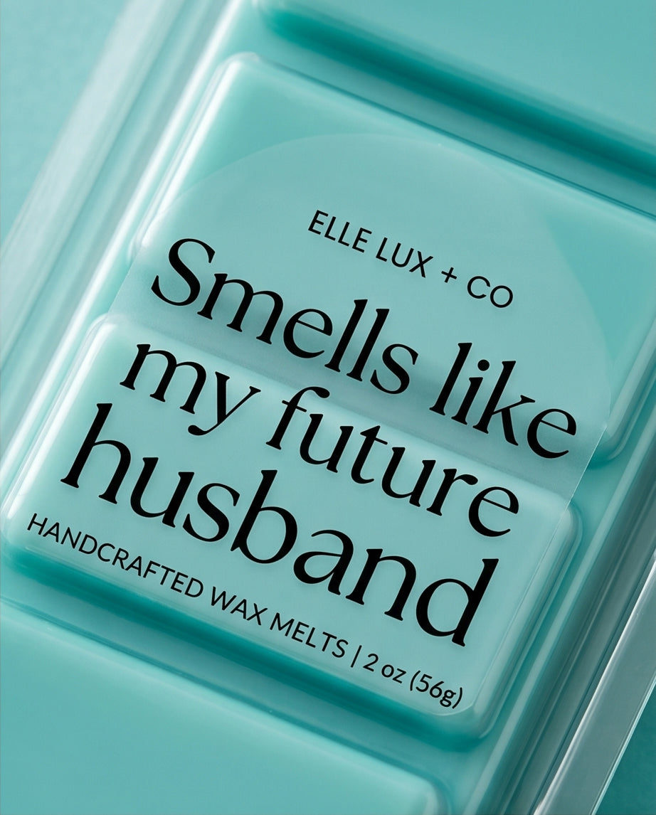 Teal wax melt packaging with text 'Smells like my future husband' by Elle Lux + Co.