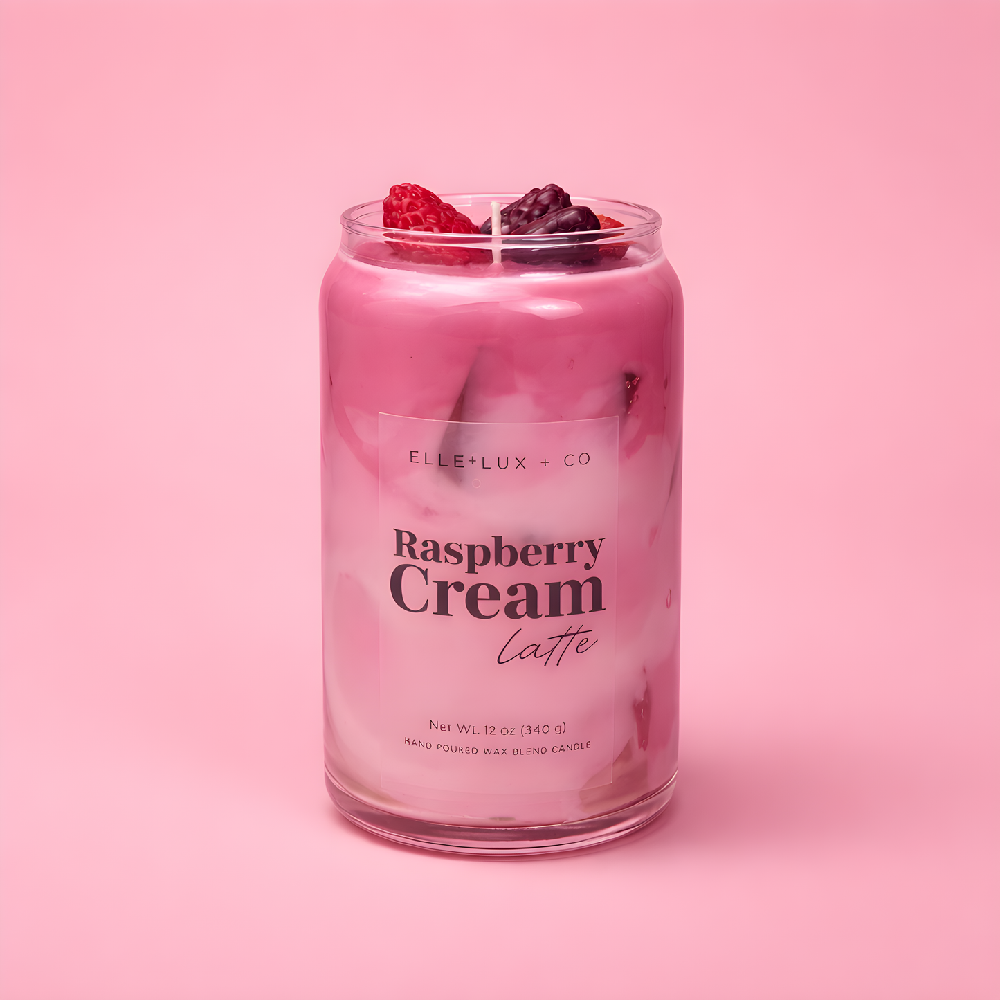 Raspberry crème latte candle with layered drink design and creamy topping, 12 oz soy blend candle